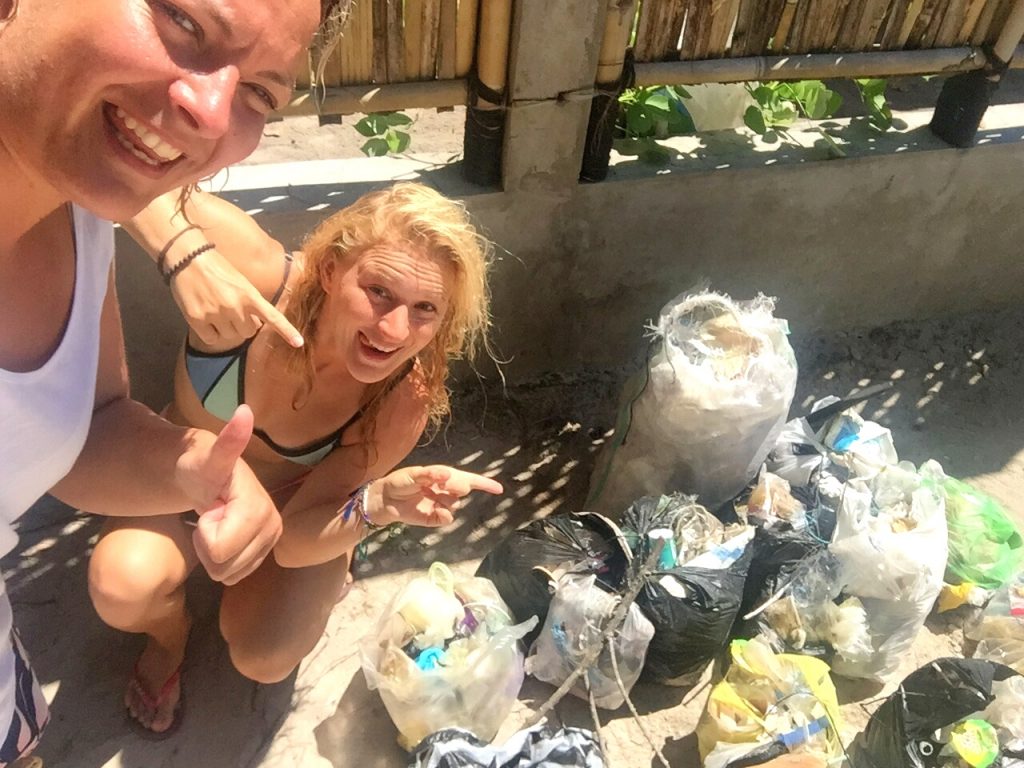 Beach cleanup against plastic pollution of oceans